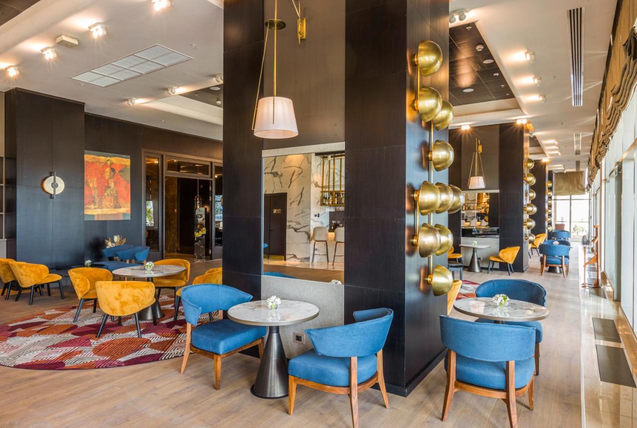 Hilton Samarkand Regency Esterno foto
